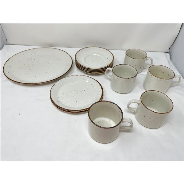 Lifestyle brand cup and saucers with serving plate