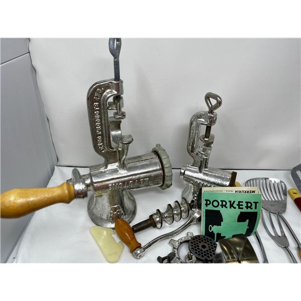Mixed kitchen implements including meat grinders
