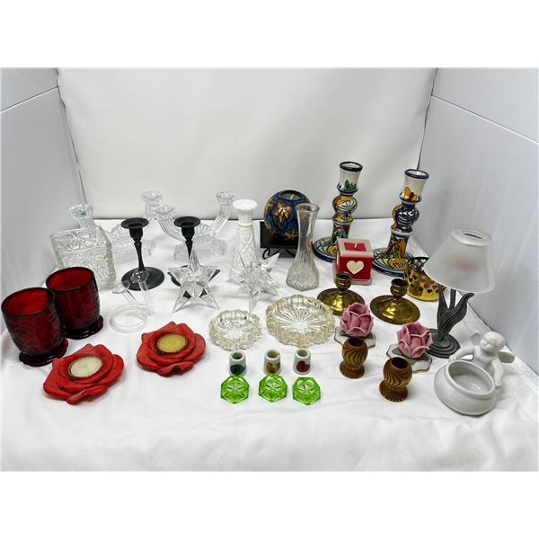 Lot of candle holders, singles pairs and sets