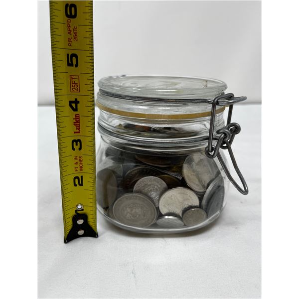 Large collection of coins and medals from Canada and around the world mixed dates and grades.