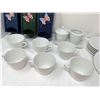 Image 2 : Cup and saucer set with three tea holders.