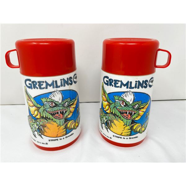 Pair of vintage Aladdin, Gremlins theme thermos