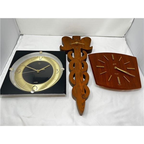 Lot of three battery operated wall clocks