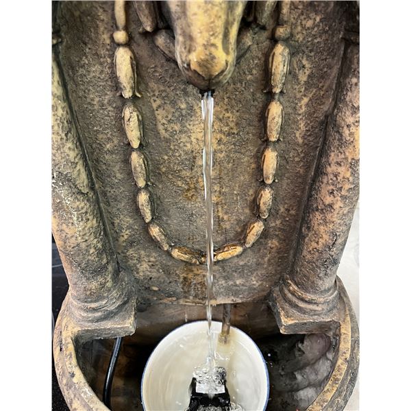 Decorative rams head water fountain