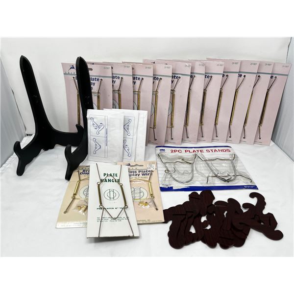 Group lot of collector plate stands and hangers