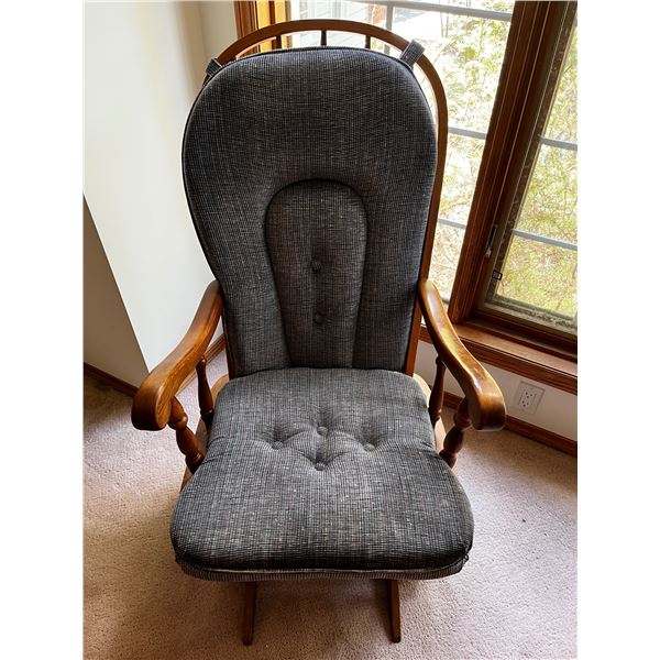 Wooden rocking chair with spring seat and cushions