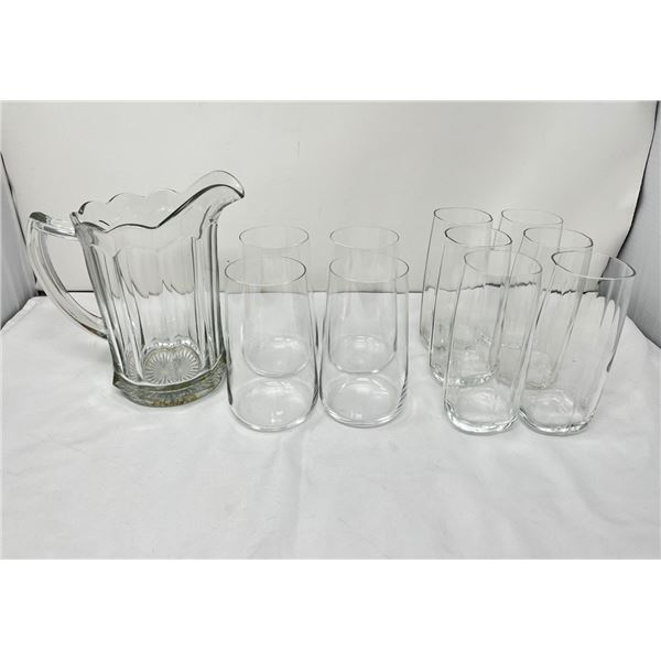 Two set of drinking glasses and pitcher