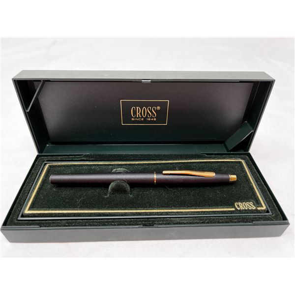 Black cross ballpoint pen with gold accents in box