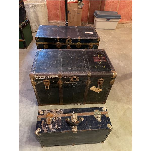 Vintage steamer trunks and suitcase