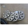 Image 5 : 3 Tires; 2) 205 75R15, 1) 175 65 R 14 & 4 Kia Hubcaps