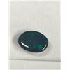 Image 2 : Natural Welo Black Opal 1.25 ct. 9.95 x 7.18 x 3.86 mm Oval Cabochon - Ethiopia- Heated Plenty Play 