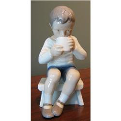 Pair of Porcelain Figurines - Boy Sitting & Girl with Puppy