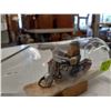 Image 2 : SMALL MOTORCYCLE FIGURINE IN A BOTTLE