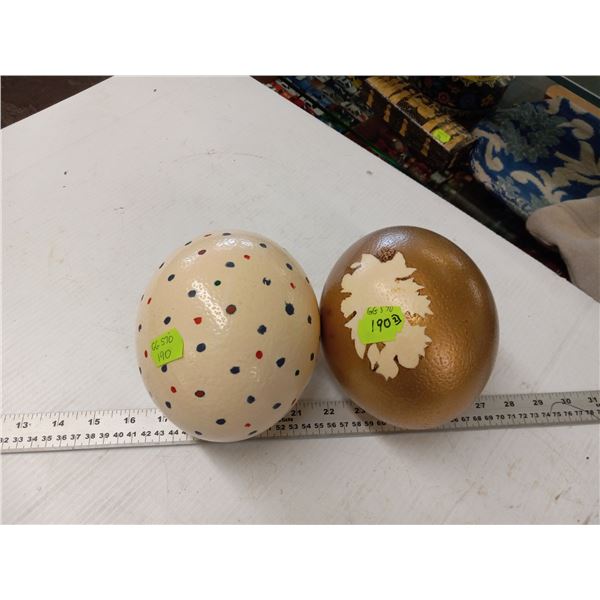 TWO PAINTED OSTRICH EGGS