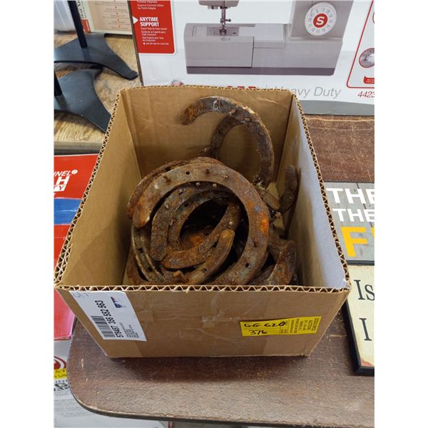 SMALL BOX OF HORSE SHOES