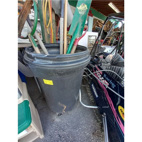 GARBAGE CAN WITH GARDEN TOOLS