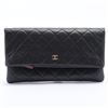 Image 1 : Chanel Black Quilted Caviar Leather CC Fold Over Clutch