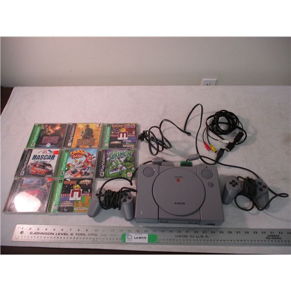 Playstation 2 with controllers and games