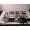 Image 1 : Original PlayStation 2 with controllers and games