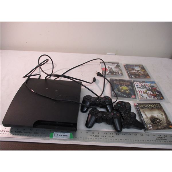 Playstation 3 with controllers and games