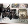 Image 4 : Playstation 3 with controllers and games