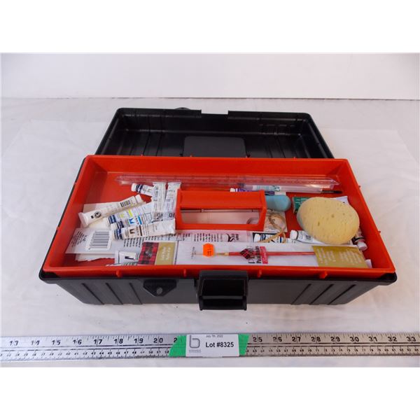 Plastic container with painting supplies