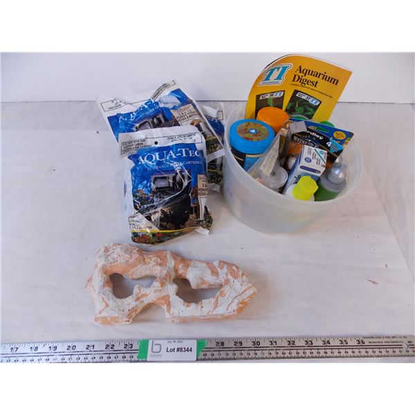 box of assorted aquarium supplies