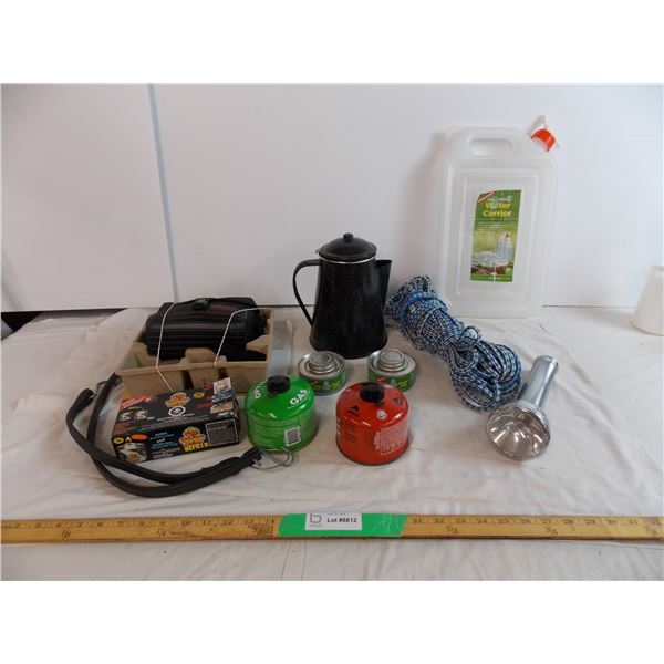 Assorted camping gear with water container and glass canisters and camera
