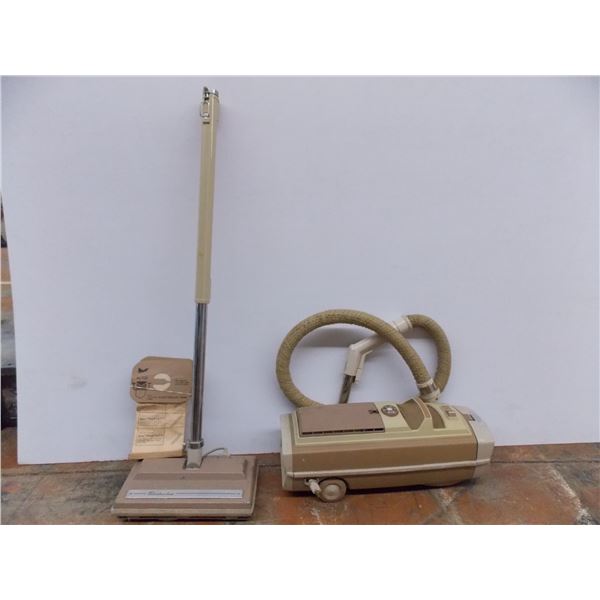 *Electrolux Vacuum with filter bags and various nozzles