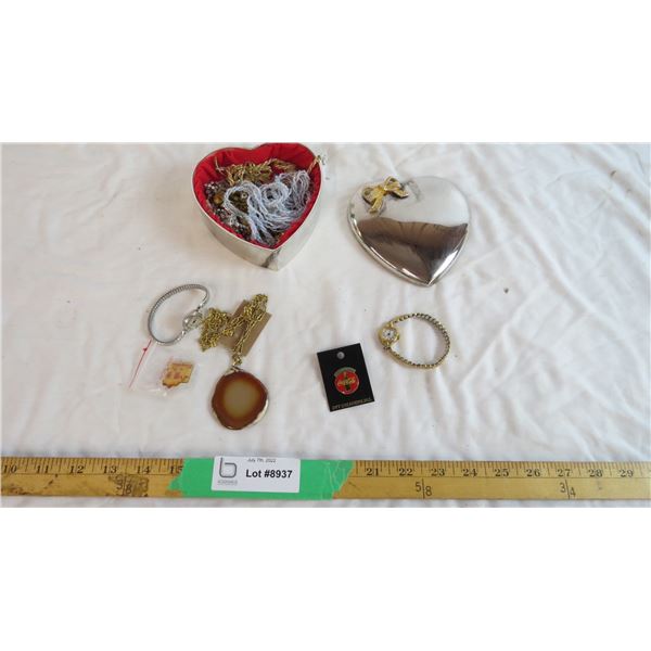 Metal heart jewelry box filled with misc things