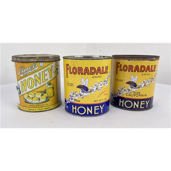 Collection of Antique Honey Tin Cans