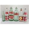 Image 1 : Group of Coca Cola Bottles
