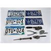 Image 1 : Collection of License Plates and Tools