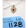 Image 1 : 10 KT Gold Heart Pendant with Ruby Center