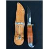 Image 2 : A Nice Eastwing Knive in Sheath with Gold Pan and Compass