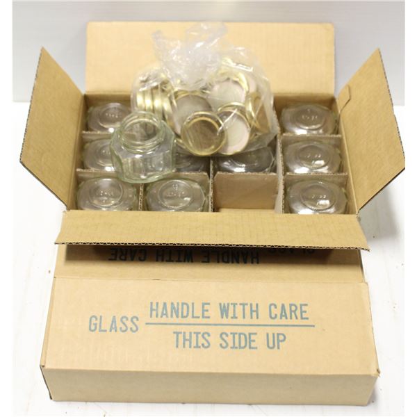 TWO CASES OF CANNING JARS W/ LIDS