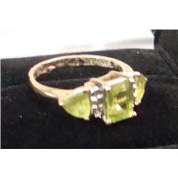 Ladies 14k Gold Ring with green stones 