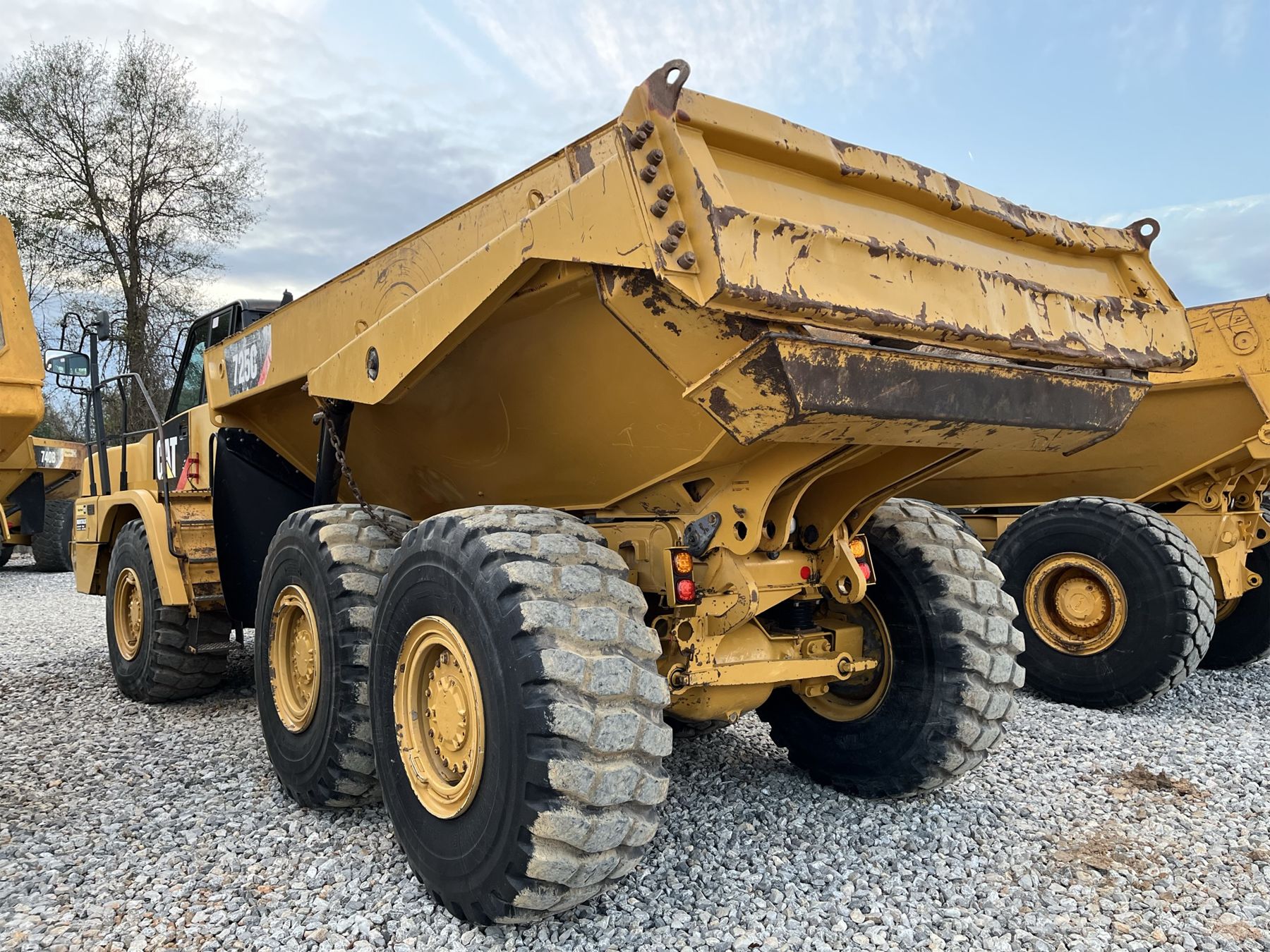 725c 2015 CAT 725C Articulated Truck - J.M. Wood Auction Company, Inc.