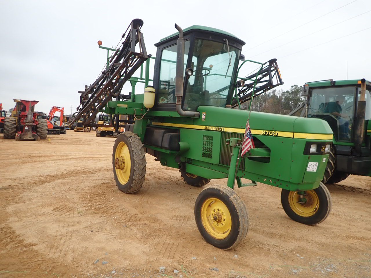 JOHN DEERE 6700 SPRAYER J.M. Wood Auction Company, Inc.