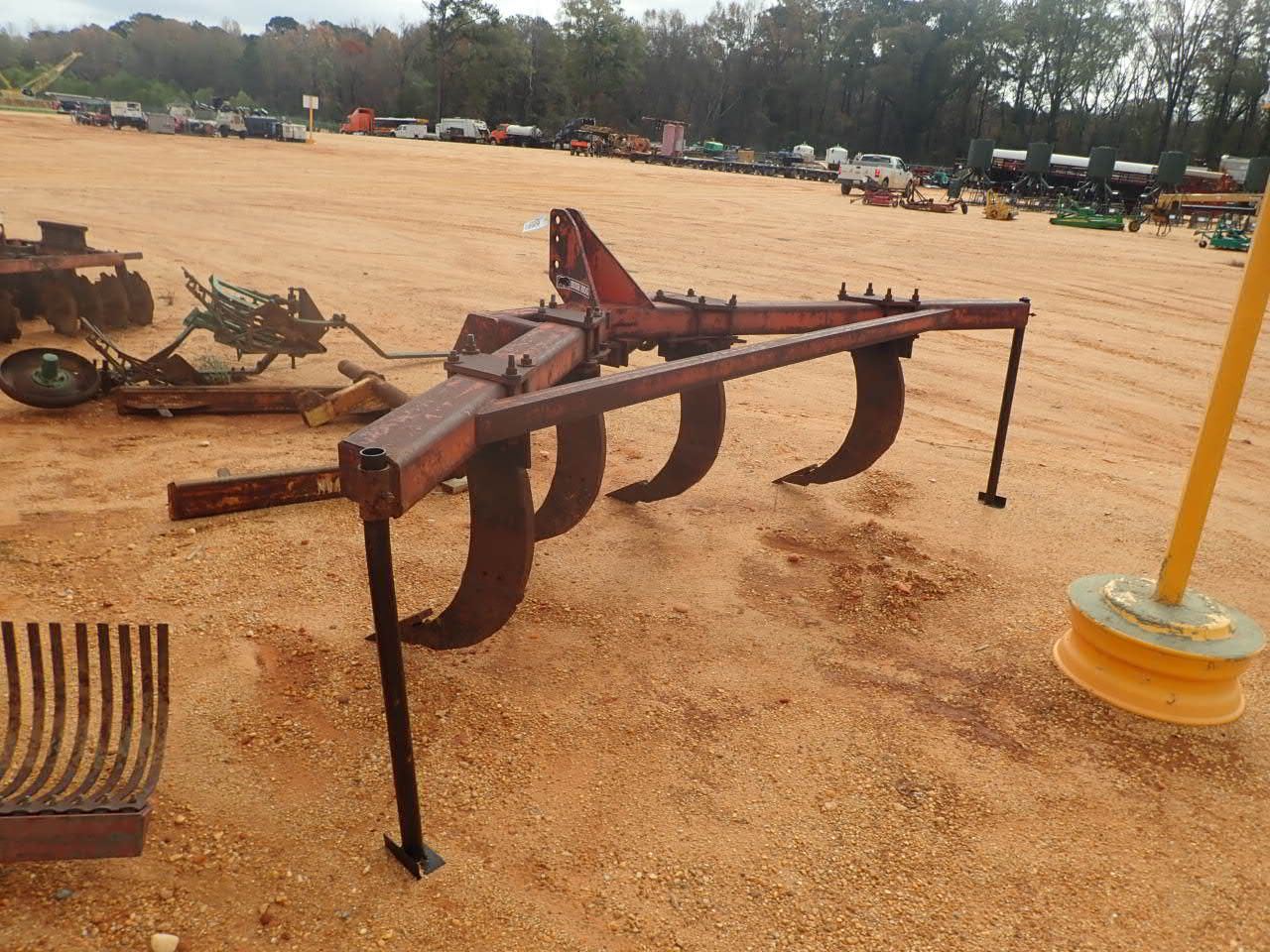 Bush Cutter Chisel BUSH HOG 4 ROW CHISEL Plow - J.M. Wood Auction Company, Inc.