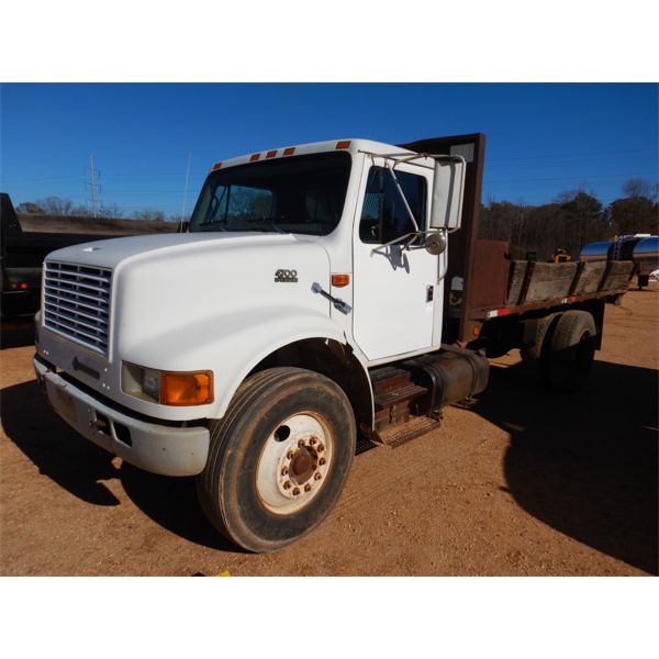 1999 INTERNATIONAL 4700 Flatbed Dump Truck