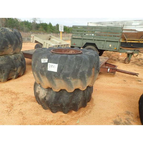 (2) LOG SKIDDER TIRES & RIMS (A4)