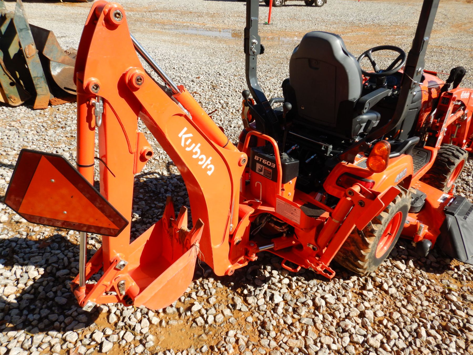 KUBOTA BX23S MINI Backhoe - J.M. Wood Auction Company, Inc.