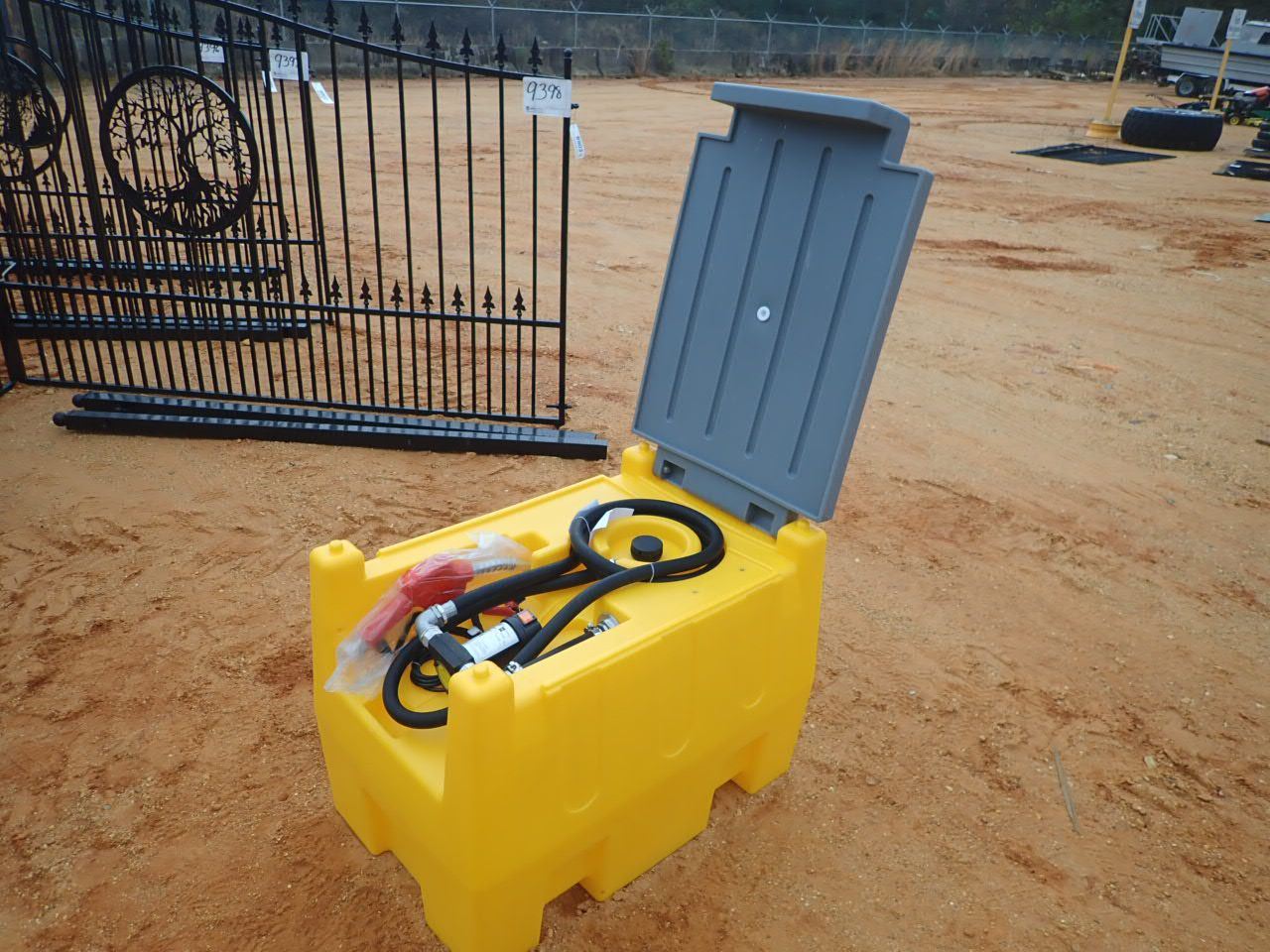 50 GALLON PLASTIC FUEL TANK W/PUMP & HOSE - J.M. Wood Auction Company, Inc.