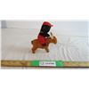 Image 1 : Black figure riding a donkey wind up toy made in a japan