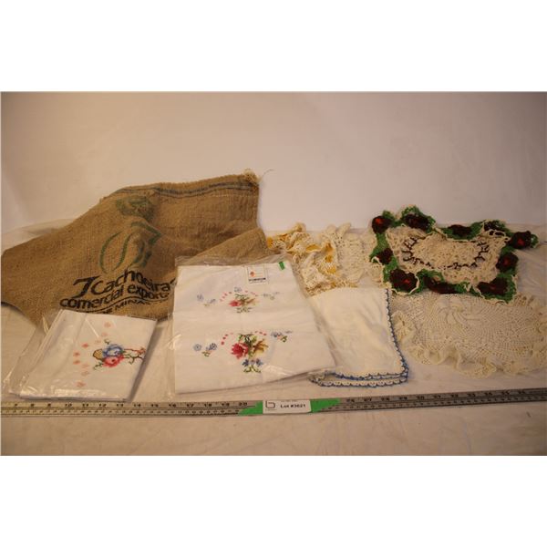 (4) Crocheted Doilies, Embroidered Handkerchief, Embroidered Cloth 20x32 and Pillow Case, Burlap Bag