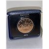 Image 1 : Royal Canadian Mint Issued Vintage 1972 Proof Cased Dollar Coin with original sleeve and display