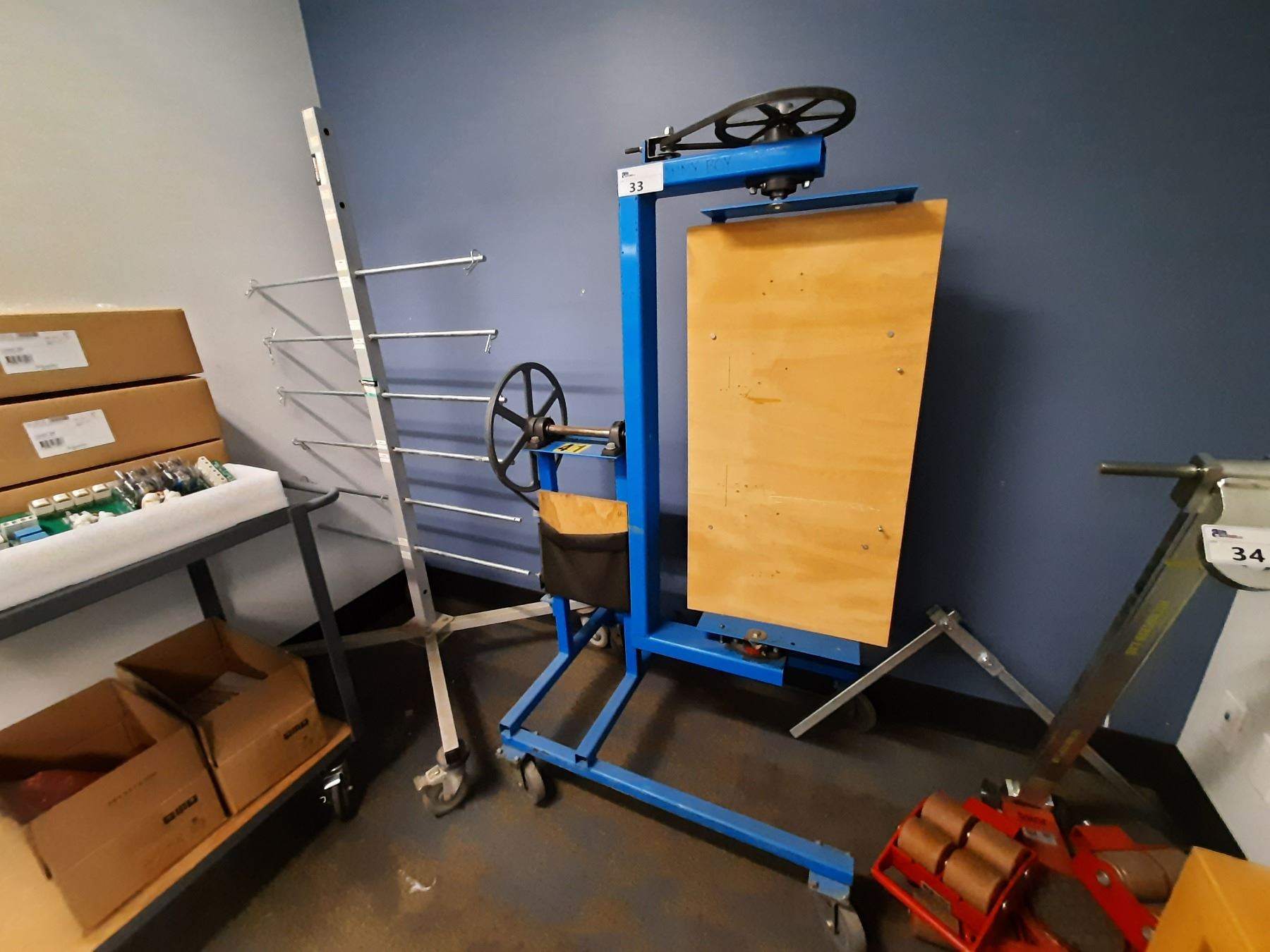 MOBILE 12 ROD COIL RACK AND MOBILE ADJUSTABLE ROTATING WORK STATION