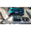 Image 2 : MAKITA CORDLESS TOOL SET - INCLUDES 2 IMPACT GUNS, FLASHLIGHT, 2 BATTERIES AND CHARGER - TESTED WORK