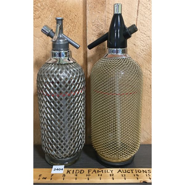 LOT OF 2 - METAL MESH SELZTER BOTTLES